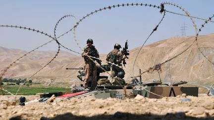 Des soldats allemands gardent un checkpoint dans la province de Baghlan, dans le nord de l'Afghanistan, le 22 ao&ucirc;t 2012. (REUTERS   )