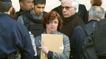 La juge d'instruction Catherine Giudicelli en 2003, lors d'une reconstitution à Vitry-sur-Seine. (© AFP)