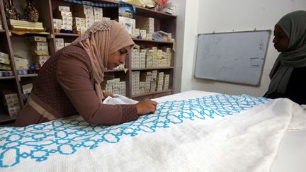 Atelier de broderie d'un camp de réfugiés palestiniens du nord de la Jordanie
 (KHALIL MAZRAAWI / AFP)