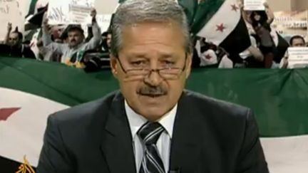 L'ambassadeur syrien en Irak, Naouaf Fares, annonce sa d&eacute;fection dans un message vid&eacute;o diffus&eacute; par la cha&icirc;ne Al Jazeera, le 12 juillet 2012. (AL JAZEERA / CAPTURE FTVI)