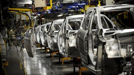 Chaîne de montage automobile en l'usine PSA Peugeot Citroën de Sochaux (AFP/JEFF PACHOUD)