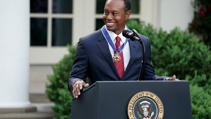 Tiger Woods à la Maison Blanche, médaille de la liberté autour du cou. (Twitter Tiger Woods)