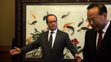 Fran&ccedil;ois Hollande, le 2 novembre 2015 &agrave; Chongqing (Chine). (JOHANNES EISELE / AFP)