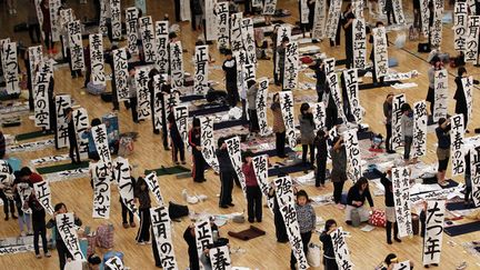 Pr&egrave;s de 3 000 personnes participent au concours annuel de calligraphie &agrave; l'occasion de la nouvelle ann&eacute;e &agrave; Tokyo (Japon), le 5 janvier 2012. (KIM KYUNG-HOON / REUTERS)