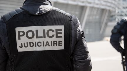 Un membre de la police judiciaire. (DENIS CHARLET / AFP)