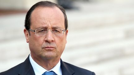 Le pr&eacute;sident fran&ccedil;ais Fran&ccedil;ois Hollande sur le perron de l'Elys&eacute;e &agrave; Paris le 29 ao&ucirc;t 2013. (KENZO TRIBOUILLARD / AFP)