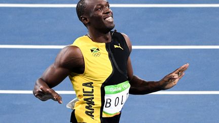 Usain Bolt remporte sa 3ème médaille d'or olympique sur 100m.  (KONSTANTIN CHALABOV / SPUTNIK)