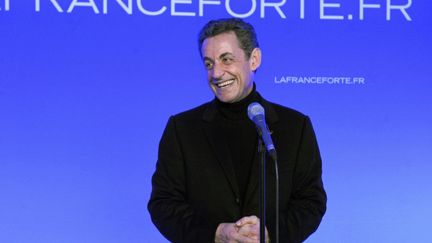 Nicolas Sarkozy lors de l'inauguration de son QG de campagne dans le 15e arrondissement &agrave; Paris le 18 f&eacute;vrier 2012. (PHILIPPE WOJAZER / POOL)