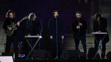 Arthur Teboul (au centre) avec son groupe Feu! Chatterton le jour de l'entrée au Panthéon de Missak Manouchian, le 21 février 2024. (VALLAURI NICOLAS / MAXPPP)