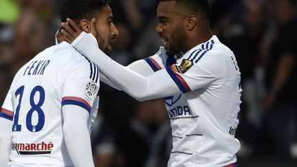 Nabil Fekir et Alexandre Lacazette  (PHILIPPE DESMAZES / AFP)