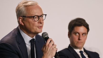 Le ministre de l'Economie Bruno Le Maire et le Premier ministre Gabriel Attal à Paris le 12 mars 2024 (LUDOVIC MARIN / POOL / AFP POOL)