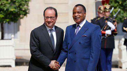 &nbsp; (François Hollande va certainement abordé la question de la Constitution avec le président Denis Sassou-Nguesso © REUTERS/Pascal Rossignol)