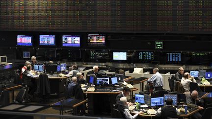 Des traders à la Bourse de Buenos Aires (Argentina), le 12 août 2019. (RONALDO SCHEMIDT / AFP)