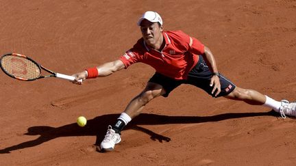 Kei Nishikori continue l'aventure sur la terre battue espagnole (JOSEP LAGO / AFP)