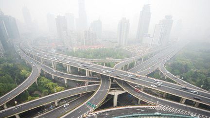 A Shanghai, la lutte contre le réchauffement climatique rejoint le combat contre la pollution de l'air. (AFP/ johannes Eisele)