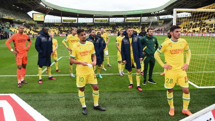 Les joueurs du FC Nantes après leur défaite contre Reims (3-0), le 2 avril 2023. (SEBASTIEN SALOM-GOMIS / AFP)