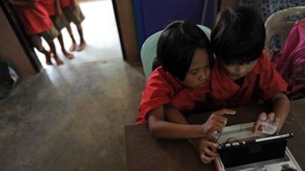 Thaïlande: un cours en école primaire à l'ère du numérique, le 27 mai 2013. (AFP)