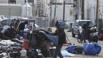 Les «homeless» sont invités à débarrasser les rues de leurs campements de fortune. Alors que 80% des Américains pensent qu'il est nécessaire de réduire les inégalités, des millions d'entre eux se retrouvent chaque matin dès 6h30 devant les banques alimentaires. Le Fonds monétaire international a sommé le pays de lutter «de façon urgente» contre ce fléau, que l'actuel président Barack Obama, n'a pas réussi à endiguer. (AP Photo / David Zalubowski)