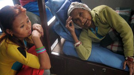 Réfugiées bhoutanaises dans un centre de transit à Katmandou, au Népal (avril 2013). Elles attendent un vol à destination des USA au titre du programme de réinstallation des Nations Unies. (AFP PHOTO / Keshab Thok STR / AFP)