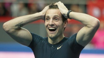 Renaud Lavillenie apr&egrave;s avoir r&eacute;ussi &agrave; passer 6,16 m, le 15 f&eacute;vrier 2014 en Ukraine.&nbsp; (ALEXANDER KHUDOTEPLY / AFP)