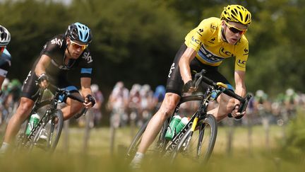 Le Britannique Chris Froome, le 13 juillet 2013, lors de la 14e &eacute;tape du Tour de France.&nbsp; (YUZURU SUNADA / BELGA MAG / AFP)