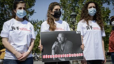 Un rassemblement en soutien au journaliste Olivier Dubois, le 8 juin 2021, retenu depuis le 8 avril au Mali.&nbsp; (JACOPO LANDI / HANS LUCAS / AFP)