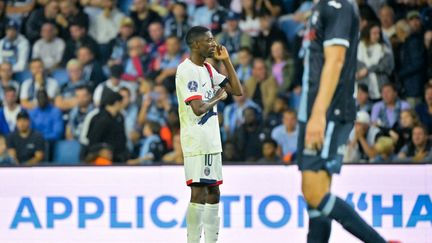 Ousmane Dembélé celebrating his goal against Le Havre with PSG during the first day of Ligue 1, August 16, 2024. (LOU BENOIST / AFP)