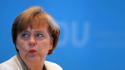 Trouver la solution pourra, cela pourra "uniquement se faire en plusieurs étapes", a insisté Angela Merkel. (AFP - Jens Buttner)