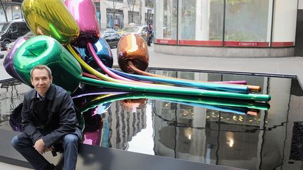 L'artiste Jeff Koons devant sa sculpture "Tulipes", New York, 2012
 (Jamie McCarthy / GETTY IMAGES NORTH AMERICA / AFP)