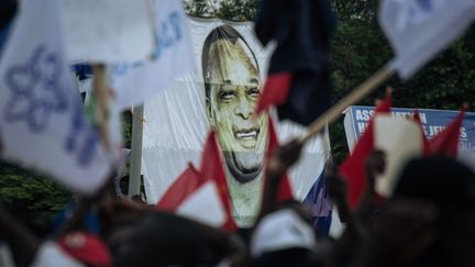 Des supporters du président sortant Denis&nbsp;Sassou-Nguesso, le 19 mars 2021 à Brazzaville (Congo-Brazzaville).&nbsp; (ALEXIS HUGUET / AFP)
