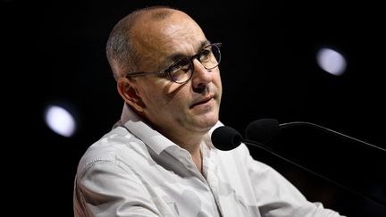 Le secrétaire général de la CFDT, Laurent Berger, prononce un discours lors de l'ouverture du 50e congrès de la Confédération française démocratique du travail (CFDT) à Lyon, le 13 juin 2022. (JEFF PACHOUD / AFP)