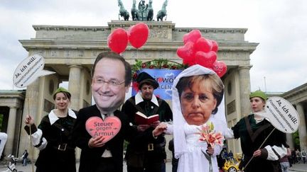 Des activistes manifestent à Berlin le 7 mai (illustration) (JOHN MACDOUGALL / AFP)