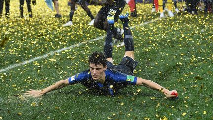 La victoire des Bleus en Coupe du monde va rapporter au football français 32,5 millions d'euros. (FRANCK FIFE / AFP)