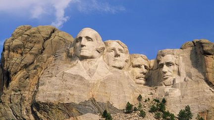 Quatre présidents américains gravés dans la pierre du Mont Rushmore: George Washington, Thomas Jefferson, Theodore Roosevelt et Abraham Lincoln. Le projet fut lancé en 1925 et s'acheva en 1941.  (CréditMARVIN NEWMAN / AGF / PHOTONONSTOP)