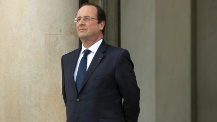 Le pr&eacute;sident Fran&ccedil;ois Hollande, au palais de l'Elys&eacute;e, &agrave; Paris, le 19 mars 2014. (ALAIN JOCARD / AFP)