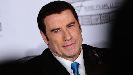 John Travolta lors d'une conf&eacute;rence de presse &agrave; New York (Etats-Unis) le 12 avril 2012. (EMMANUEL DUNAND / AFP)