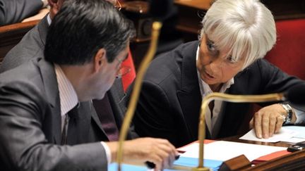 La ministre de l'Economie, Christine Lagarde, avec le premier ministre, François Fillon, à l'Assemblée le 28 septembre (AFP - BORIS HORVAT)