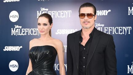 Angelina Jolie et Brad Pitt lors de la premi&egrave;re de "Mal&eacute;fique", &agrave; Hollywood (Californie), mercredi 28 mai 2014. (JASON MERRITT / GETTY IMAGES NORTH AMERICA / AFP)