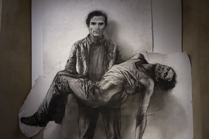 En 2015, Ernest Pignon-Ernest immortalise Pasolini en référence à une Pietà de Michel-Ange. (GUY CHRISTIAN / HEMIS.FR / AFP)