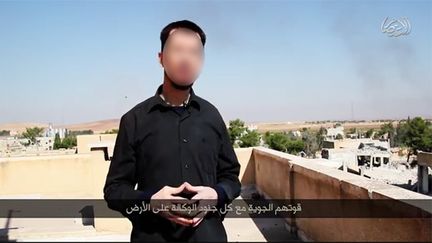 &nbsp; (Syrie: le groupe de l'Etat islamique diffuse une vidéo d'un otage à Kobané © Capture d'écran YouTube)