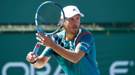 Lucas Pouille en compétition, avant le confinement (Le Coq Sportif)