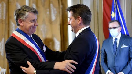 Gilles Artigues et&nbsp;Gaël Perdriau lors de la séance d'installation du conseil municipal de Saint-Etienne (Loire), le 3 juillet 2020. (MAXPPP)