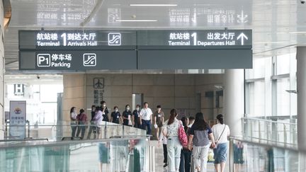 Des voyageurs à l'aéroport de Nanjing, le 29 juillet 2020 en Chine. (JI CHUNPENG / XINHUA)