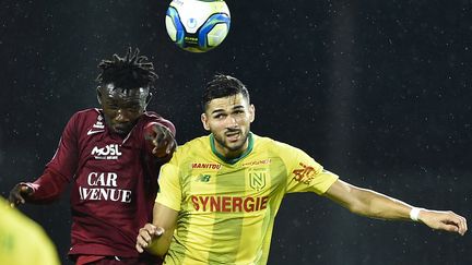 Mehdi Abeid (à d.), le 19 octobre 2019. (JEAN-CHRISTOPHE VERHAEGEN / AFP)