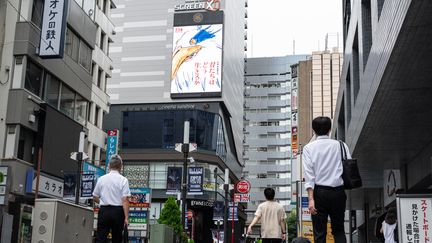 Affiche du dernier film du Japonais Hayao Miyazaki "Et vous, comment vivrez-vous", sorti le 13 juillet au Japon (RICHARD A. BROOKS / AFP)