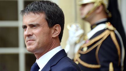 Le Premier ministre Manuel Valls sur le perron de Matignon, &agrave; Paris, le 2 septembre 2014. (BERTRAND GUAY / AFP)