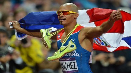 Felix Sanchez renversant sur 400 m haies  (JEWEL SAMAD / AFP)