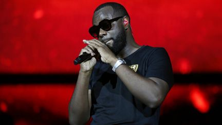 Le rappeur Gims (Gandhi Djuna) sur scène au Stade de France à Saint-Denis (93), le 28 septembre 2019. (ZAKARIA ABDELKAFI / AFP)