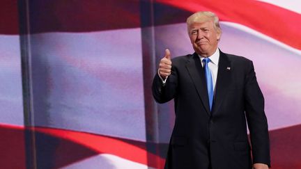 Le milliardaire Donald Trump sur la scène de la convention du parti républicain, à Cleveland (Ohio, Etats-Unis), le 18 juillet 2016. (CHIP SOMODEVILLA / GETTY IMAGES NORTH AMERICA / AFP)