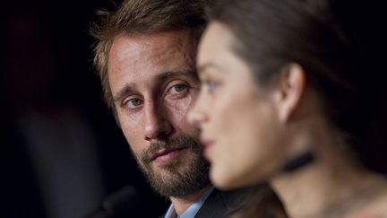 La r&eacute;v&eacute;lation du festival c'est lui : le Belge Matthias Schoenaerts, h&eacute;ros de "De rouille et d'os" au c&ocirc;t&eacute; de Marion Cotillard (D). (IAN LANGSDON / EPA / MAXPPP)